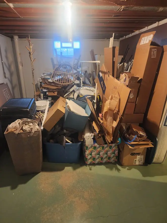 Roll-off dumpster container at job site for 20 Yard Dumpster Rental in Stapleton